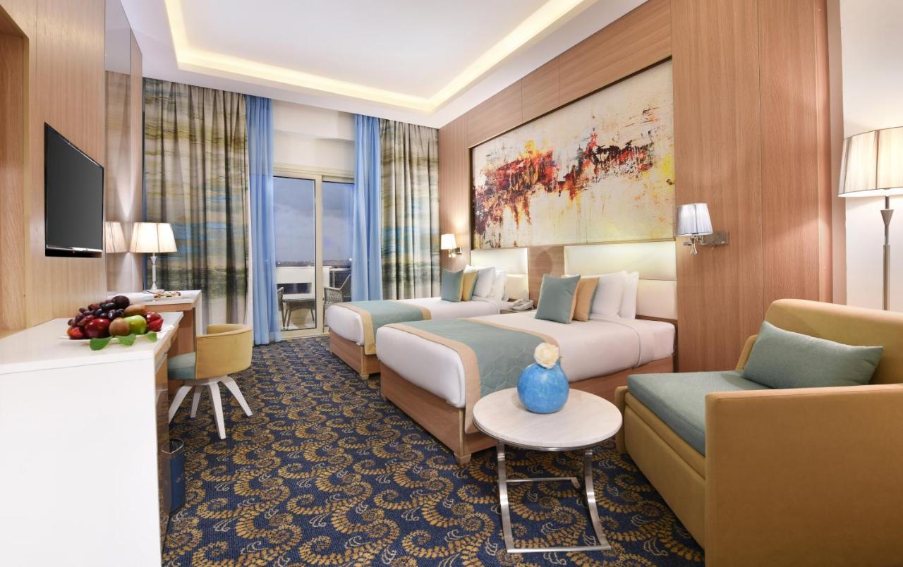 Tolip Gardens Hotel カイロ エクステリア 写真 A room at the hotel